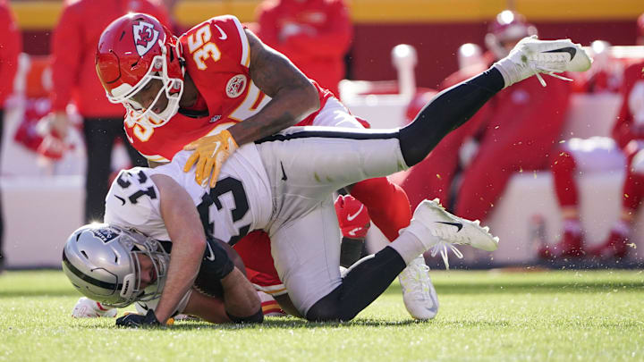 Dec 12, 2021; Kansas City, Missouri, USA; Las Vegas Raiders wide receiver Hunter Renfrow (13) runs the ball and is tackled by Kansas City Chiefs cornerback Charvarius Ward (35) during the first half at GEHA Field at Arrowhead Stadium. Mandatory Credit: Denny Medley-Imagn Images