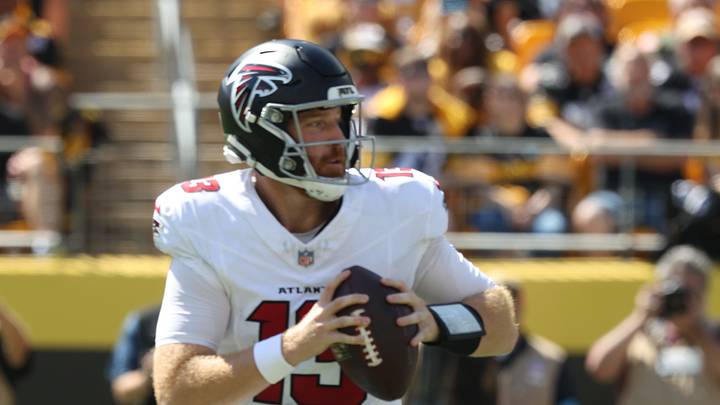 Sep 13, 2026; Pittsburgh, Pennsylvania, USA;  Atlanta Falcons quarterback Cooper Rush (13) rolls out during the second quarter against the Pittsburgh Steelers at Acrisure Stadium.  Mandatory Credit: Charles LeClaire-Imagn Images
