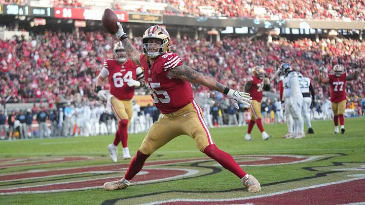 Dec 14, 2025; Santa Clara, California, USA; San Francisco 49ers tight end George Kittle (85) scores a touchdown during the third quarter against the Tennessee Titans at Levi's Stadium. Mandatory Credit: Cary Edmondson-Imagn Images Dec 14, 2025; Santa Clara, California, USA; San Francisco 49ers tight end George Kittle (85) scores a touchdown during the third quarter against the Tennessee Titans at Levi's Stadium. Mandatory Credit: Cary Edmondson-Imagn Images