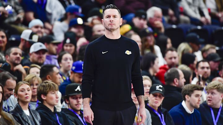 Dec 1, 2024; Salt Lake City, Utah, USA; Los Angeles Lakers head coach JJ Redick on the court against the Utah Jazz during the first half at the Delta Center. Mandatory Credit: Christopher Creveling-Imagn Images Dec 1, 2024; Salt Lake City, Utah, USA; Los Angeles Lakers head coach JJ Redick on the court against the Utah Jazz during the first half at the Delta Center. Mandatory Credit: Christopher Creveling-Imagn Images