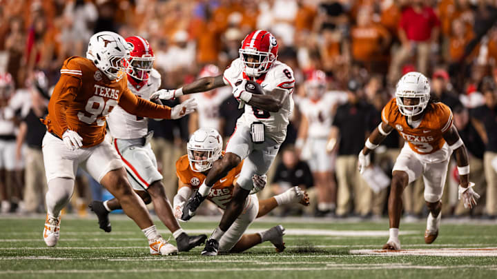 Oct 19, 2024; Austin, Texas, USA; Georgia Bulldogs wide receiver Dominic Lovett (6) runs the ball against the Texas Longhorns during the second quarter at Darrell K Royal-Texas Memorial Stadium. Mandatory Credit: Brett Patzke-Imagn Images