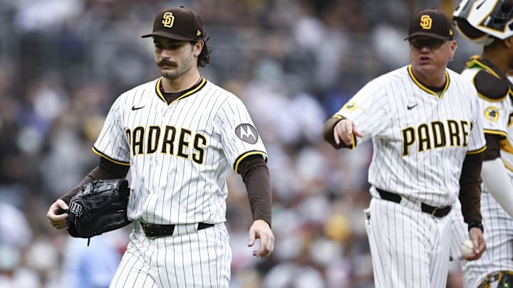 Jun 21, 2025; San Diego, California, USA; San Diego Padres starting pitcher Dylan Cease (84) leaves the game as manager Mie Shildt looks on during the seventh inning against the Kansas City Royals at Petco Park. Mandatory Credit: Denis Poroy-Imagn Images Jun 21, 2025; San Diego, California, USA; San Diego Padres starting pitcher Dylan Cease (84) leaves the game as manager Mie Shildt looks on during the seventh inning against the Kansas City Royals at Petco Park. Mandatory Credit: Denis Poroy-Imagn Images