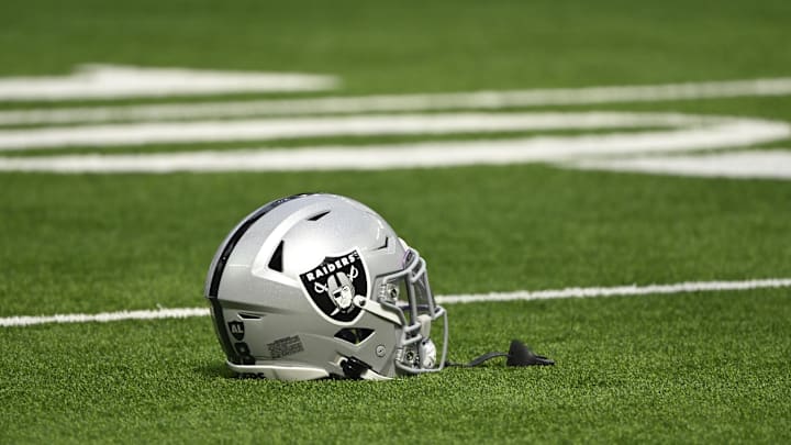 Oct 20, 2024; Inglewood, California, USA; Las Vegas Raiders helmet on the turn at SoFi Stadium during pregame warmups before an NFL game against the Los Angeles Rams. Mandatory Credit: Robert Hanashiro-Imagn Images