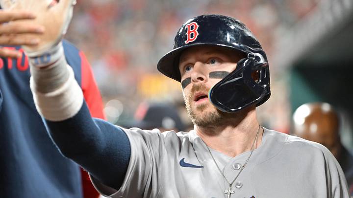 Apr 10, 2026; St. Louis, Missouri, USA; Boston Red Sox shortstop Trevor Story (10) is congratulated in the dugout after scoring in the fourth inning against the St. Louis Cardinals at Busch Stadium. Mandatory Credit: Tim Vizer-Imagn Images