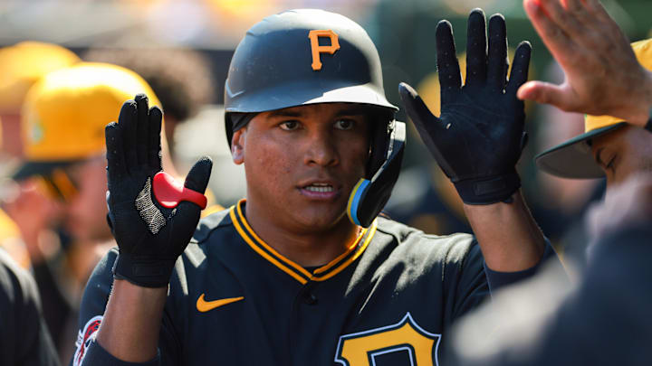 Mar 1, 2026; Jupiter, Florida, USA; Pittsburgh Pirates left fielder Jhostynxon Garcia (34) celebrates after hitting a home run against the St. Louis Cardinals during the fourth inning at Roger Dean Chevrolet Stadium. Mandatory Credit: Sam Navarro-Imagn Images