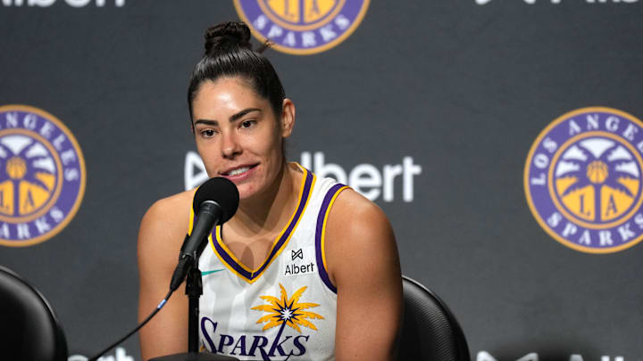 May 16, 2025; San Francisco, California, USA; Los Angeles Sparks guard Kelsey Plum (10) talks with media members after the game against the Golden State Valkyries at Chase Center. Mandatory Credit: Darren Yamashita-Imagn Images May 16, 2025; San Francisco, California, USA; Los Angeles Sparks guard Kelsey Plum (10) talks with media members after the game against the Golden State Valkyries at Chase Center. Mandatory Credit: Darren Yamashita-Imagn Images