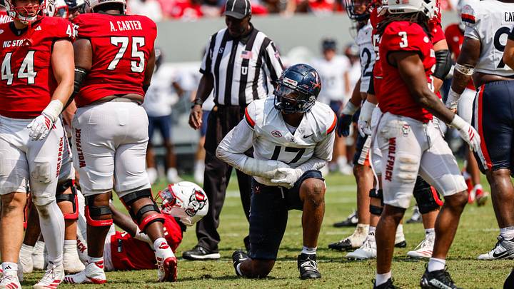 Sep 6, 2025; Raleigh, North Carolina, USA; Virginia Cavaliers wide receiver TyLyric Coleman (17) clutches his hand during the second half of the game against North Carolina State Wolfpack at Carter-Finley Stadium. Mandatory Credit: Jaylynn Nash-Imagn Images Sep 6, 2025; Raleigh, North Carolina, USA; Virginia Cavaliers wide receiver TyLyric Coleman (17) clutches his hand during the second half of the game against North Carolina State Wolfpack at Carter-Finley Stadium. Mandatory Credit: Jaylynn Nash-Imagn Images