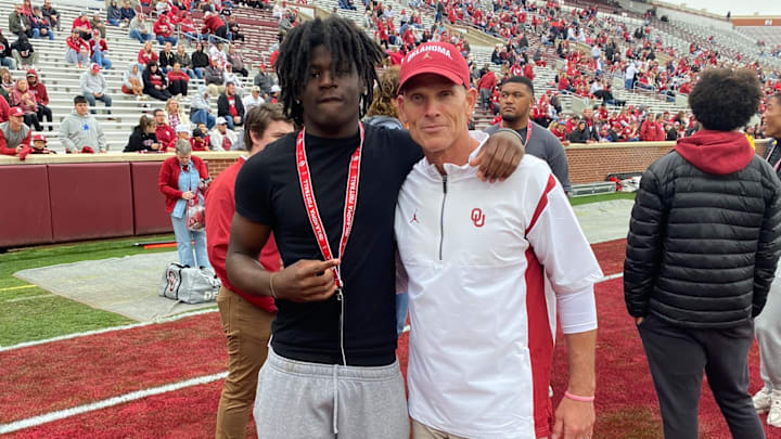 Defensive line recruit Isaiah Williams and Oklahoma coach Brent Venables