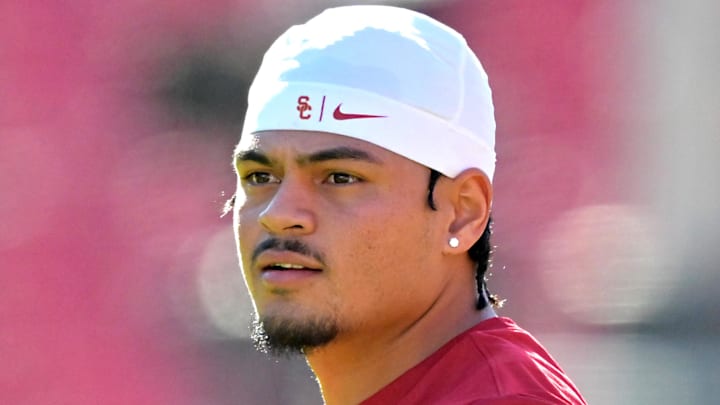 Oct 11, 2025; Los Angeles, California, USA;  USC Trojans quarterback Jayden Maiava (14) warms up prior to the game against the Michigan Wolverines at United Airlines Field at the Los Angeles Memorial Coliseum.