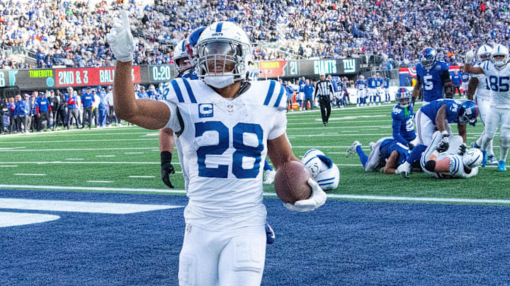 Dec 29, 2024; East Rutherford, New Jersey, USA; Indianapolis Colts running back Jonathan Taylor (28) scoring a 2nd quarter touchdown against the New York Giants at MetLife Stadium. Mandatory Credit: Robert Deutsch-Imagn Images Dec 29, 2024; East Rutherford, New Jersey, USA; Indianapolis Colts running back Jonathan Taylor (28) scoring a 2nd quarter touchdown against the New York Giants at MetLife Stadium. Mandatory Credit: Robert Deutsch-Imagn Images