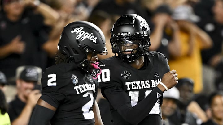 Oct 26, 2024; College Station, Texas, USA; Texas A&M Aggies quarterback Marcel Reed (10) celebrates after scoring a touchdown in the fourth quarter against the LSU Tigers at Kyle Field. Mandatory Credit: Maria Lysaker-Imagn Images. 