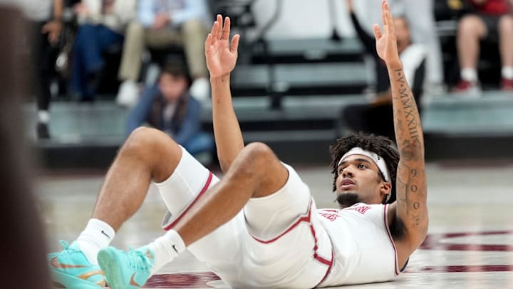 Feb 25, 2026; Tuscaloosa, AL, USA; Alabama forward Amari Allen (5) signals as he lays on his back after hitting a three pointer and being fouled during the game with Mississippi State at Coleman Coliseum. Mandatory Credit: Gary Cosby Jr.-Tuscaloosa News