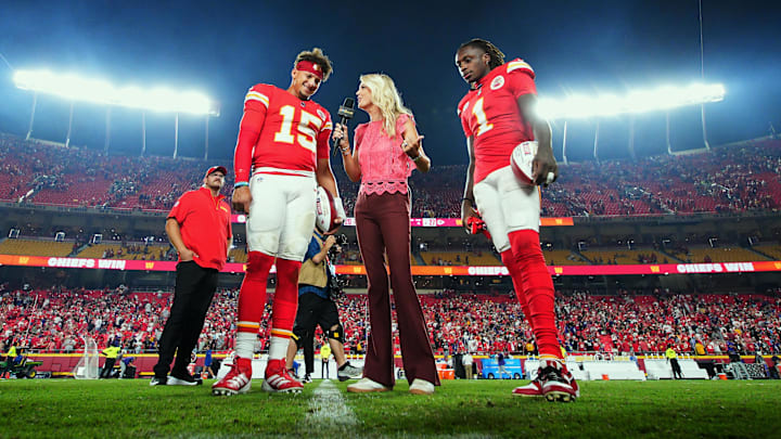 Sep 5, 2024; Kansas City, Missouri, USA; Kansas City Chiefs starting quarterback Patrick Mahomes (15) and wide receiver Xavier Worthy (1) talk with reporter Melissa Stark after defeating the Baltimore Ravens at GEHA Field at Arrowhead Stadium. Mandatory Credit: Jay Biggerstaff-Imagn Images