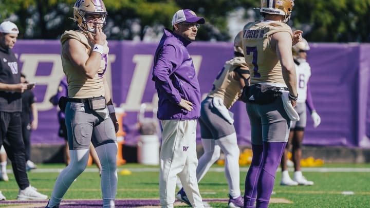 Jedd Fisch hangs out with his quarterbacks during spring ball. Jedd Fisch hangs out with his quarterbacks during spring ball.