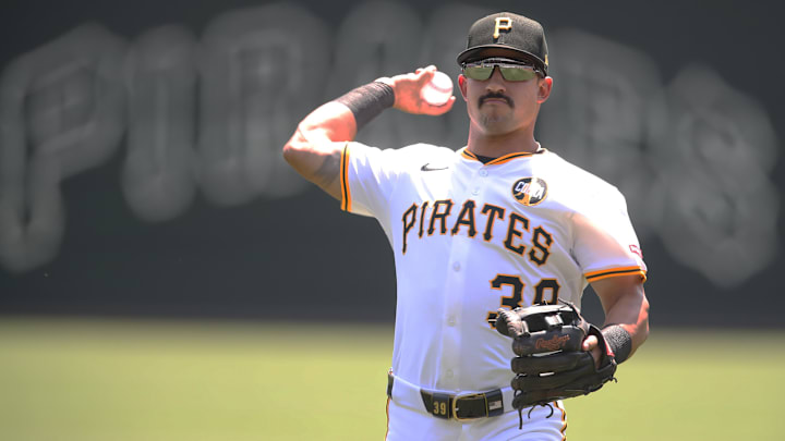 Aug 10, 2025; Pittsburgh, Pennsylvania, USA; Pittsburgh Pirates second baseman Nick Gonzales (39) warms up before the game against the Cincinnati Reds at PNC Park. Mandatory Credit: Charles LeClaire-Imagn Images Aug 10, 2025; Pittsburgh, Pennsylvania, USA; Pittsburgh Pirates second baseman Nick Gonzales (39) warms up before the game against the Cincinnati Reds at PNC Park. Mandatory Credit: Charles LeClaire-Imagn Images