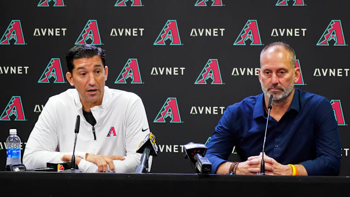 Diamondbacks GM Mike Hazen (left) speaks to the media with Diamondbacks head coach Torey Lovullo after the team was eliminated from playoff contention at Chase Field in Phoenix on Oct. 1, 2024.