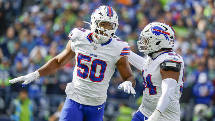 Oct 27, 2024; Seattle, Washington, USA; Buffalo Bills defensive end Greg Rousseau (50) celebrates with defensive end Dawuane Smoot (94) after blocking a pass against the Seattle Seahawks during the first quarter at Lumen Field. Oct 27, 2024; Seattle, Washington, USA; Buffalo Bills defensive end Greg Rousseau (50) celebrates with defensive end Dawuane Smoot (94) after blocking a pass against the Seattle Seahawks during the first quarter at Lumen Field.