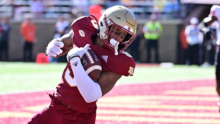 Sep 28, 2024; Chestnut Hill, Massachusetts, USA; Boston College Eagles wide receiver Jerand Bradley (9) makes a catch in the end zone for a touchdown against the Western Kentucky Hilltoppers during the second half at Alumni Stadium. Mandatory Credit: Eric Canha-Imagn Images