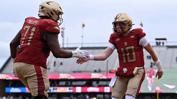 Oct 17, 2026; Chestnut Hill, MA, USA; Boston College Eagles quarterback Mason McKenzie (10) celebrates a touchdown play to Evan Dickens (not pictured) against the Pittsburgh Panthers with offensive lineman Kristian Phillips (71) during the second half at Alumni Stadium. Mandatory Credit: Eric Canha-Imagn Images Oct 17, 2026; Chestnut Hill, MA, USA; Boston College Eagles quarterback Mason McKenzie (10) celebrates a touchdown play to Evan Dickens (not pictured) against the Pittsburgh Panthers with offensive lineman Kristian Phillips (71) during the second half at Alumni Stadium. Mandatory Credit: Eric Canha-Imagn Images
