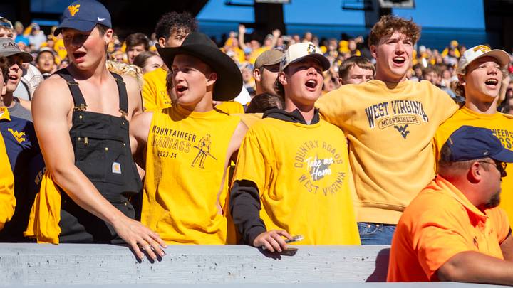 Oct 17, 2026; Morgantown, West Virginia, USA;  West Virginia Mountaineers fans "Country Roads" after defeating the Cincinnati Bearcats at Milan Puskar Stadium.  Mandatory Credit: Ben Queen-Imagn Images