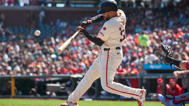 San Francisco Giants infielder LaMonte Wade Jr. hits an RBI single against the St. Louis Cardinals during the first inning. San Francisco Giants infielder LaMonte Wade Jr. hits an RBI single against the St. Louis Cardinals during the first inning.