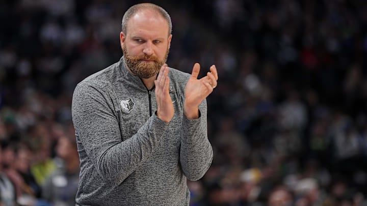 Jan 18, 2024; Minneapolis, Minnesota, USA; Memphis Grizzlies head coach Taylor Jenkins applauds