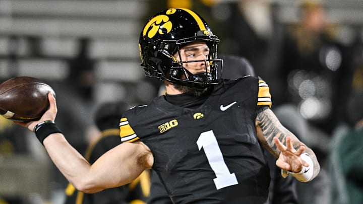Nov 29, 2024; Iowa City, Iowa, USA; Iowa Hawkeyes quarterback Brendan Sullivan (1) warms up before the game against the Nebraska Cornhuskers at Kinnick Stadium. Mandatory Credit: Jeffrey Becker-Imagn Images