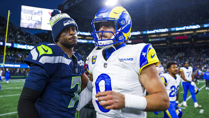 Nov 3, 2024; Seattle, Washington, USA; Seattle Seahawks quarterback Geno Smith (7) and Los Angeles Rams quarterback Matthew Stafford (9) greet each other following an overtime victory by the Rams at Lumen Field. Mandatory Credit: Joe Nicholson-Imagn Images Nov 3, 2024; Seattle, Washington, USA; Seattle Seahawks quarterback Geno Smith (7) and Los Angeles Rams quarterback Matthew Stafford (9) greet each other following an overtime victory by the Rams at Lumen Field. Mandatory Credit: Joe Nicholson-Imagn Images