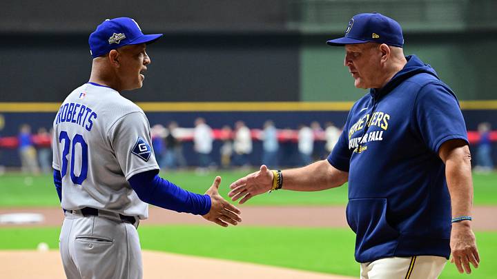 Oct 13, 2025; Milwaukee, Wisconsin, USA; Los Angeles Dodgers manager Dave Roberts (30) greets Milwaukee Brewers manager Pat Murphy (49) prior to game one of the NLCS round for the 2025 MLB playoffs at American Family Field. Mandatory Credit: Benny Sieu-Imagn Images Oct 13, 2025; Milwaukee, Wisconsin, USA; Los Angeles Dodgers manager Dave Roberts (30) greets Milwaukee Brewers manager Pat Murphy (49) prior to game one of the NLCS round for the 2025 MLB playoffs at American Family Field. Mandatory Credit: Benny Sieu-Imagn Images
