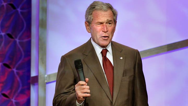 Former President George W. Bush reacts to a standing ovation by the crowd during the Southeastern University Leadership Forum at the college in Lakeland Fl. , Thursday March 10, 2011. Ernst Peters/The Ledger.