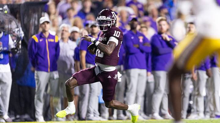 Redshirt sophomore quarterback Marcel Reed (10) runs deep during Texas A&M football’s game against LSU at Tiger Stadium on Saturday, Oct. 25, 2025. Redshirt sophomore quarterback Marcel Reed (10) runs deep during Texas A&M football’s game against LSU at Tiger Stadium on Saturday, Oct. 25, 2025.
