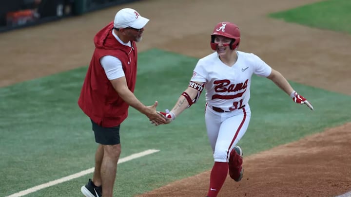 Alabama Head Coach Patrick Murphy and Alabama Softball Player Alexis Pupillo (31) in action against Florida State during the Dugout Club Classic at Joanne Graf Field in Tallahassee, FL on Saturday, Feb 21, 2026.