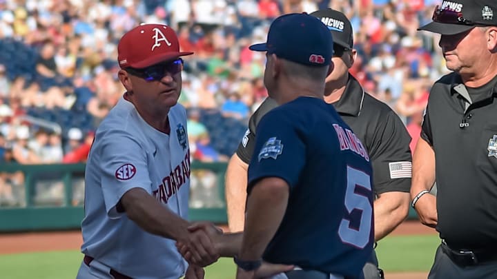 Arkansas Razorbacks head coach Dave Van Horn and Ole Miss Rebels head coach Mike Bianco meet before the game at Charles Schwab Field. Arkansas Razorbacks head coach Dave Van Horn and Ole Miss Rebels head coach Mike Bianco meet before the game at Charles Schwab Field.