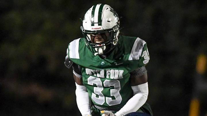 Dutch Fork Silver Foxes Ethan Moze (33) celebrates after tackling Dorman Cavaliers Nick Means (1) Friday, Nov. 28, 2025, during the SCHSL semi state football game at Dutch Fork High School in Irmo, South Carolina. Dutch Fork Silver Foxes Ethan Moze (33) celebrates after tackling Dorman Cavaliers Nick Means (1) Friday, Nov. 28, 2025, during the SCHSL semi state football game at Dutch Fork High School in Irmo, South Carolina.