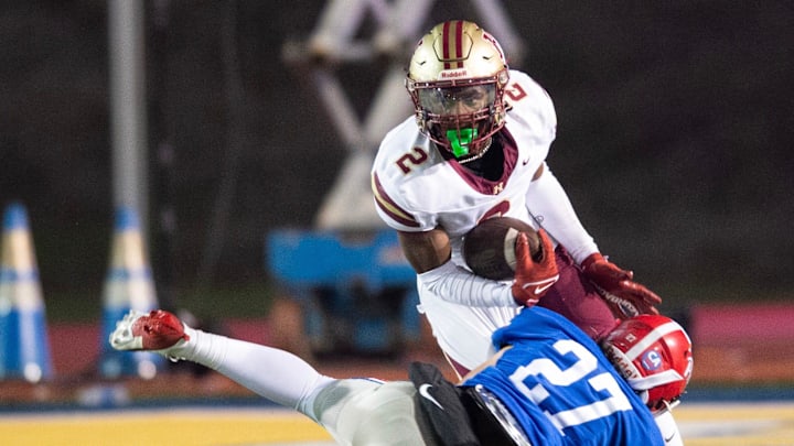 Hartfield's Bralan Womack (2) cuts to get past Prep's Russell Robbins (27) during the MAIS 6A championship at Mississippi College in Clinton, Miss., Saturday, Nov. 23, 2024. Hartfield won by a score of 19-14. Hartfield's Bralan Womack (2) cuts to get past Prep's Russell Robbins (27) during the MAIS 6A championship at Mississippi College in Clinton, Miss., Saturday, Nov. 23, 2024. Hartfield won by a score of 19-14.