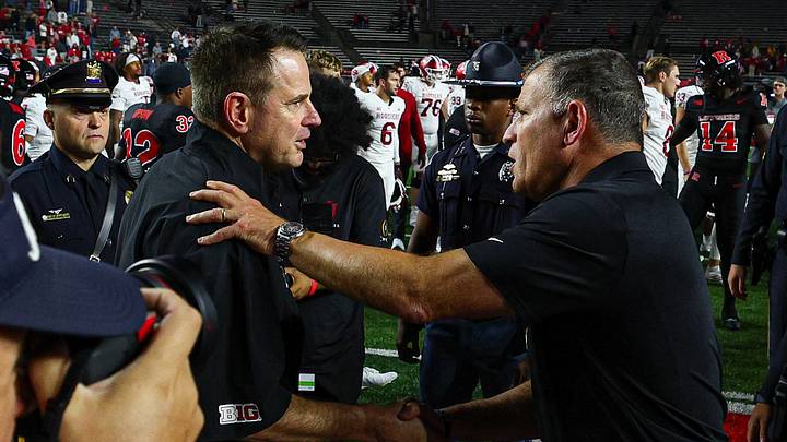 Oct 3, 2026; Piscataway, New Jersey, USA; Indiana Hoosiers head coach Curt Cignetti, left, talks with Rutgers Scarlet Knights head coach Greg Schiano after the game at SHI Stadium. Mandatory Credit: Vincent Carchietta-Imagn Images