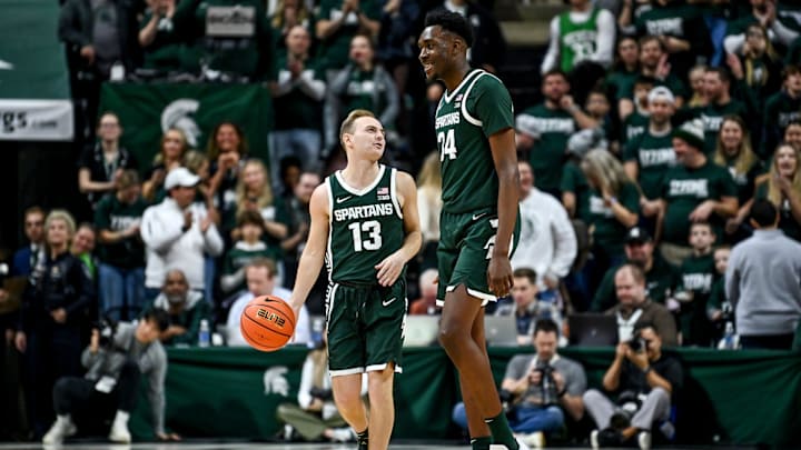 Michigan State's Steven Izzo, left, talks with Xavier Booker as time expires in the game against Penn State on Thursday, Jan. 4, 2024, in East Lansing.