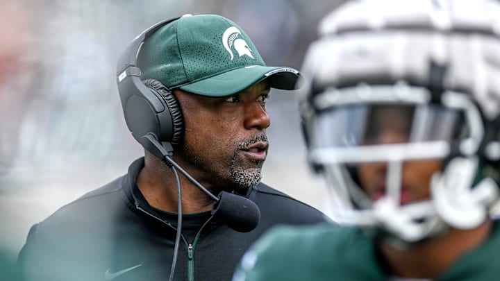Michigan State's wide receivers coach Courtney Hawkins looks on during the spring game on Saturday, April 16, 2022, at Spartan Stadium in East Lansing. Michigan State's wide receivers coach Courtney Hawkins looks on during the spring game on Saturday, April 16, 2022, at Spartan Stadium in East Lansing.