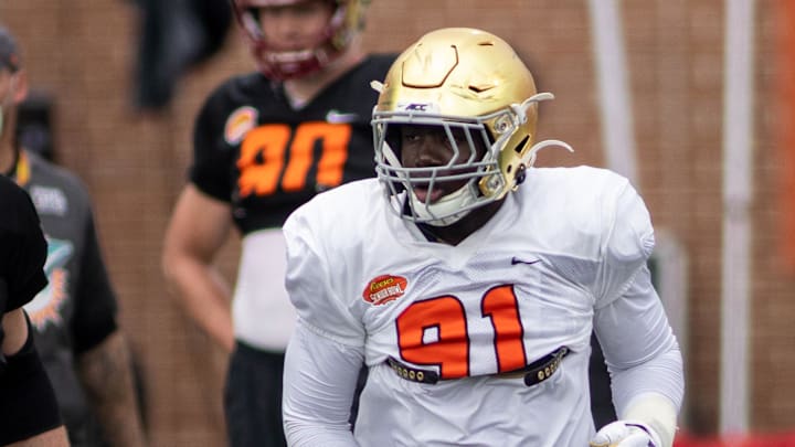 Jan 26, 2021; Mobile, Alabama, USA; National defensive lineman Ade Ogundeji of Notre Dame  (91) drills during National team practice during the 2021 Senior Bowl week.