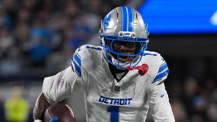 Detroit Lions wide receiver Jameson Williams (1) runs for yards after catch