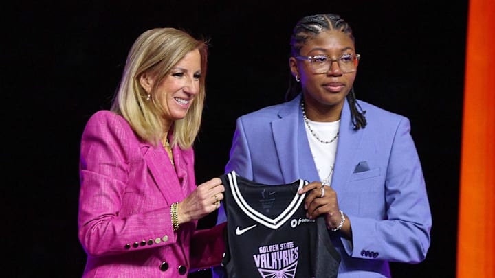 Apr 14, 2025; New York, New York, USA; Shyanne Sellers poses with WNBA commissioner Cathy Engelbert after being selected with the number seventeen overall pick to the Golden State Valkyries in the 2025 WNBA Draft at The Shed at Hudson Yards. Mandatory Credit: Vincent Carchietta-Imagn Images 