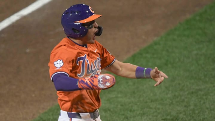 Clemson infielder Josh Paino (8) scores the second run of the game against South Carolina during the bottom of the first inning at Doug Kingsmore Stadium in Clemson, S.C. Friday, February 28, 2025.