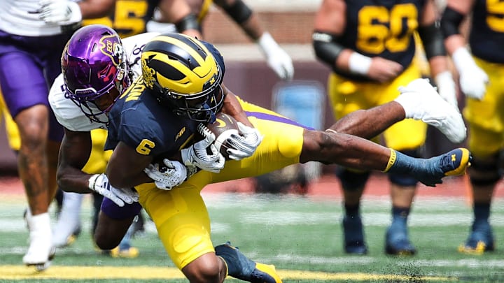 Michigan wide receiver Cornelius Johnson makes a catch against East Carolina defensive back Shavon Revel during the second half of U-M's 30-3 win on Saturday, Sept. 2, 2023, at Michigan Stadium. Michigan wide receiver Cornelius Johnson makes a catch against East Carolina defensive back Shavon Revel during the second half of U-M's 30-3 win on Saturday, Sept. 2, 2023, at Michigan Stadium.