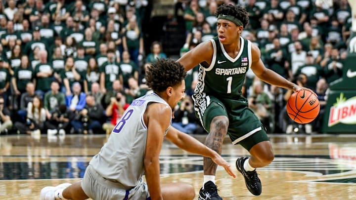 Michigan State's Jeremy Fears Jr.,right, moves the ball as Northwestern's Tre Singleton falls down during the first half on Thursday, Jan. 8, 2026, at the Breslin Center in East Lansing. Michigan State's Jeremy Fears Jr.,right, moves the ball as Northwestern's Tre Singleton falls down during the first half on Thursday, Jan. 8, 2026, at the Breslin Center in East Lansing.
