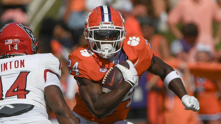 Sep 21, 2024; Clemson, South Carolina, USA; Clemson Tigers running back David Eziomume (24) runs the North Carolina State Wolfpack during the fourth quarter at Memorial Stadium.
