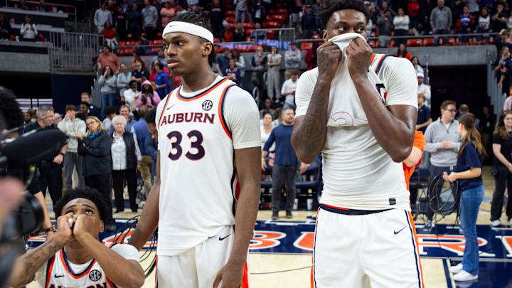 Auburn Tigers players watch the replay of a possible game winning shot that was called back as Auburn Tigers take on Texas A&M Aggies at Neville Arena in Auburn, Ala. on Tuesday, Jan. 6, 2026. Texas A&M Aggies defeated Auburn Tigers 90-88.