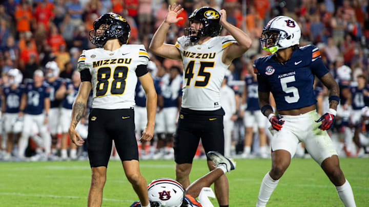 Missouri Tigers kicker Robert Meyer (88) and Missouri Tigers holder Connor Weselman (45) react to a missed field goal in the first overtime as Auburn Tigers take on Missouri Tigers at Jordan-Hare Stadium in Auburn, Ala. on Saturday, Oct. 18, 2025. Missouri Tigers defeated the Auburn Tigers 23-17 in 2OT.