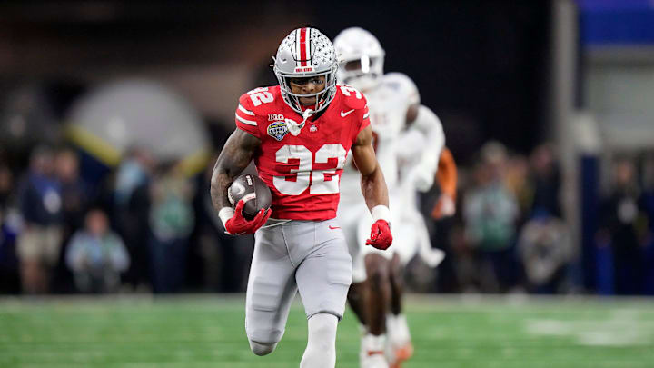 Ohio State Buckeyes running back TreVeyon Henderson (32) scores a touchdown on a 75-yard touchdown catch and run against Texas Longhorns in the second quarter of the Cotton Bowl Classic during the College Football Playoff semifinal game at AT&T Stadium in Arlington, Texas on January, 10, 2025.