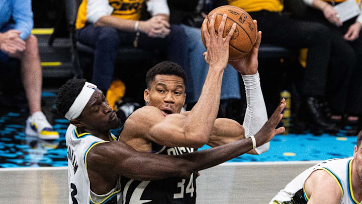 Apr 29, 2025; Indianapolis, Indiana, USA: Milwaukee Bucks forward Giannis Antetokounmpo (34) shoots the ball while Indiana Pacers forward Pascal Siakam (43)  defends during game five of the first round for the 2024 NBA Playoffs at Gainbridge Fieldhouse. Mandatory Credit: Trevor Ruszkowski-Imagn Images
