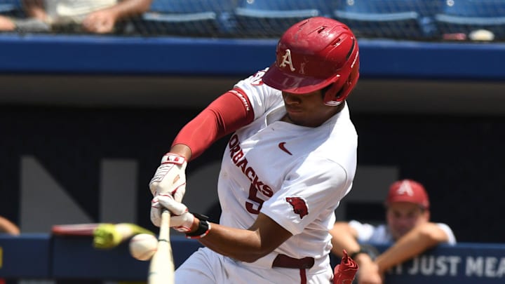 May 22 2024; Hoover, AL, USA; Arkansas batter Kendall Diggs connects with a pitch against South Carolina at the Hoover Met during the SEC Tournament.